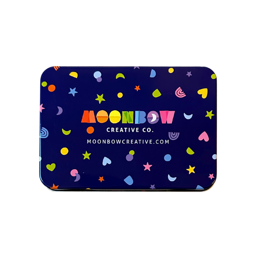 Tin with colorful patterns and 'Moonbow Creative Co.' branding on a dark blue background
