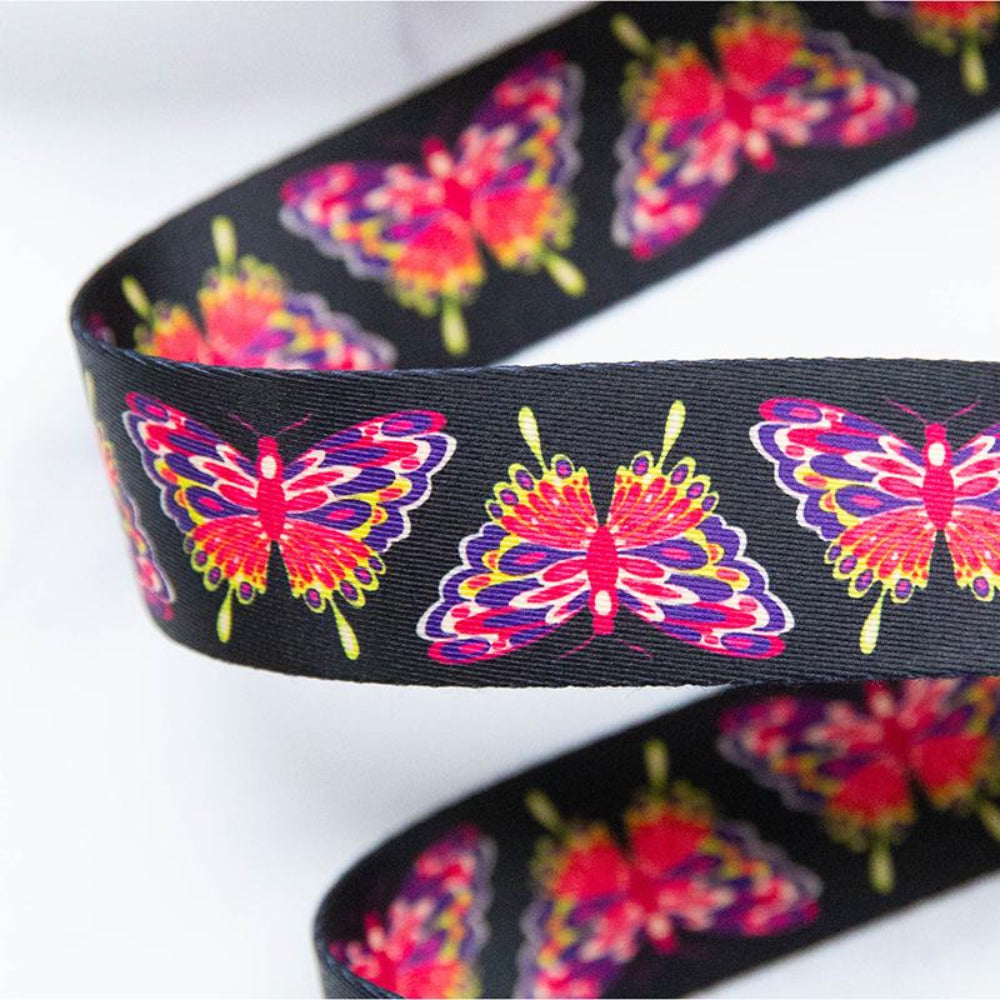 Butterfly patterned webbing on a black background