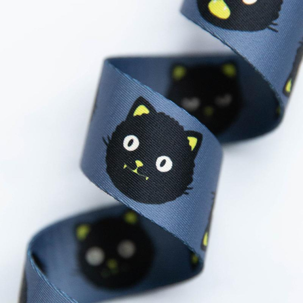 Blue webbing with black cat illustrations on a white background