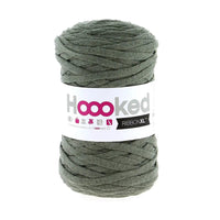 Ball of green yarn with a 'Hoooked' label on a white background
