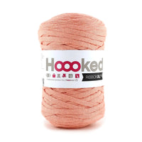 Ball of pink yarn with a Hoooked label on a white background