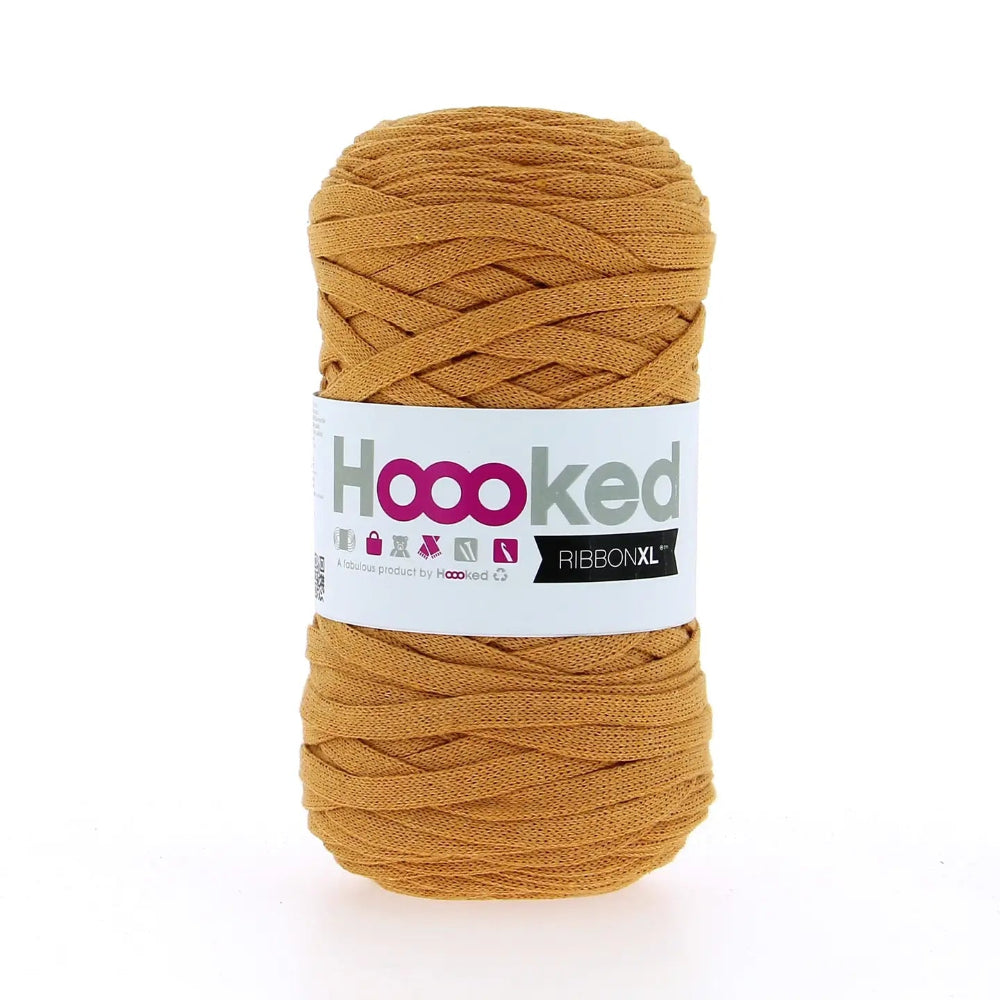 Ball of mustard yellow yarn with a 'Hooked' label on a white background