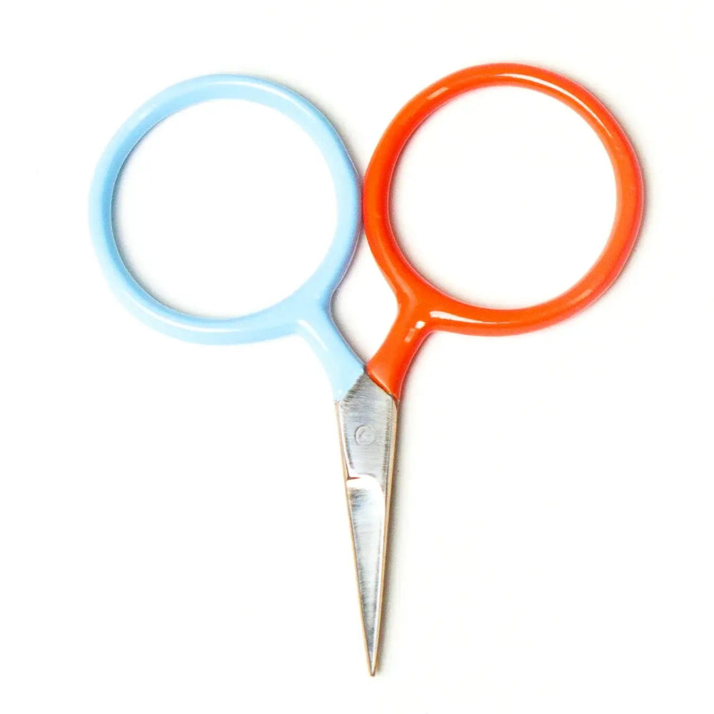 Pair of scissors with blue and orange handles on a white background