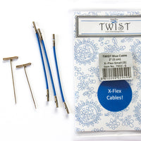 Packaged X-Flex cables with blue cables and metal tips on a white background