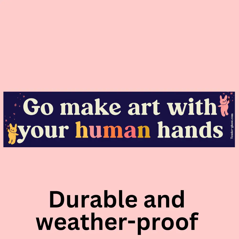blue sticker that reads "go make art with your human hands"