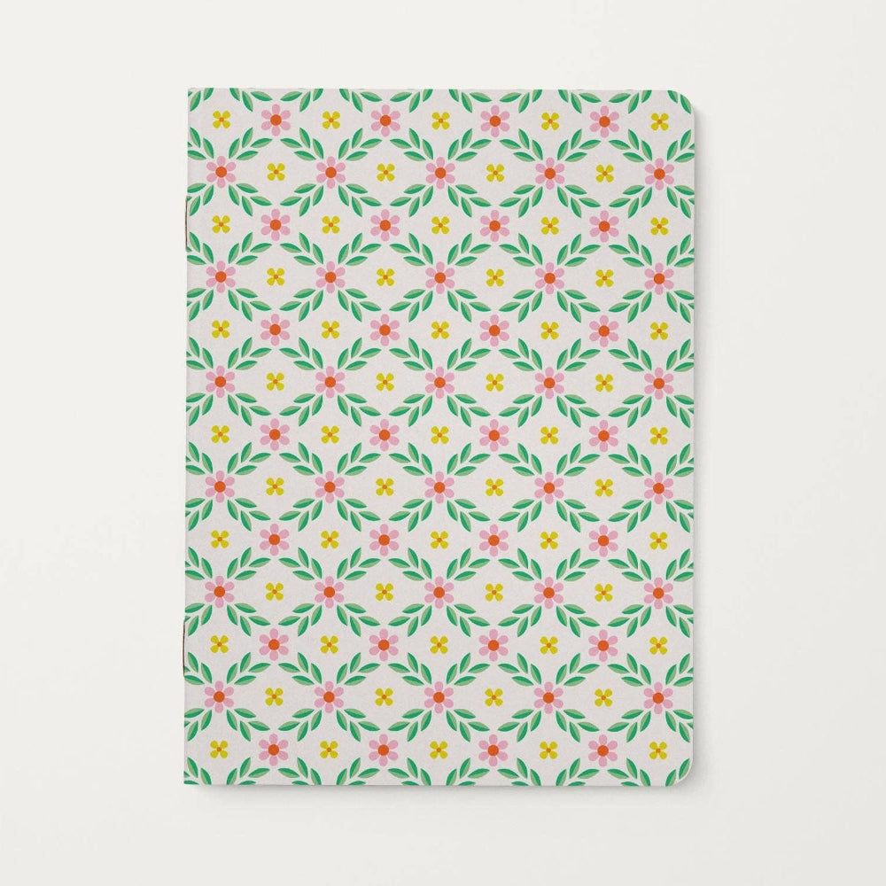 Floral patterned notebook on a white background