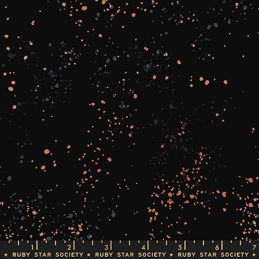 Fabric with star pattern and 'Ruby Star Society' label on a black background