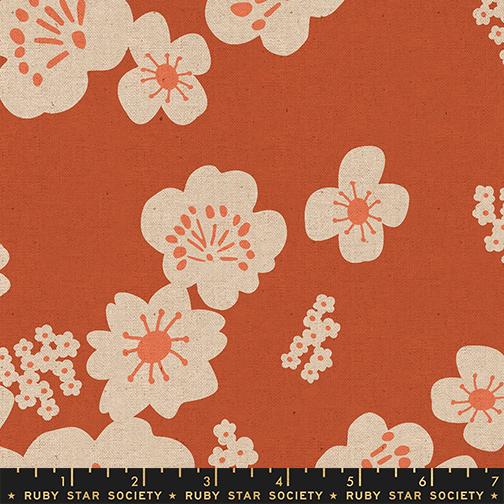Floral pattern fabric swatch on a red background with Ruby Star Society label.