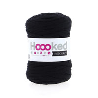 Black yarn ball with a 'Hooked' label on a white background