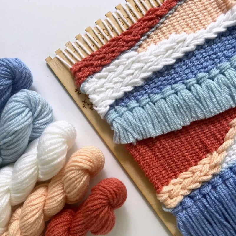 Woven fabric with colorful yarn on a white background