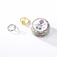 Coley tension ring packaging with two rings on a white background