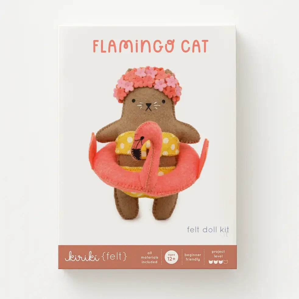 Flamingo cat felt doll kit packaging with a brown cat-like character holding a pink flamingo and wearing a flower crown.