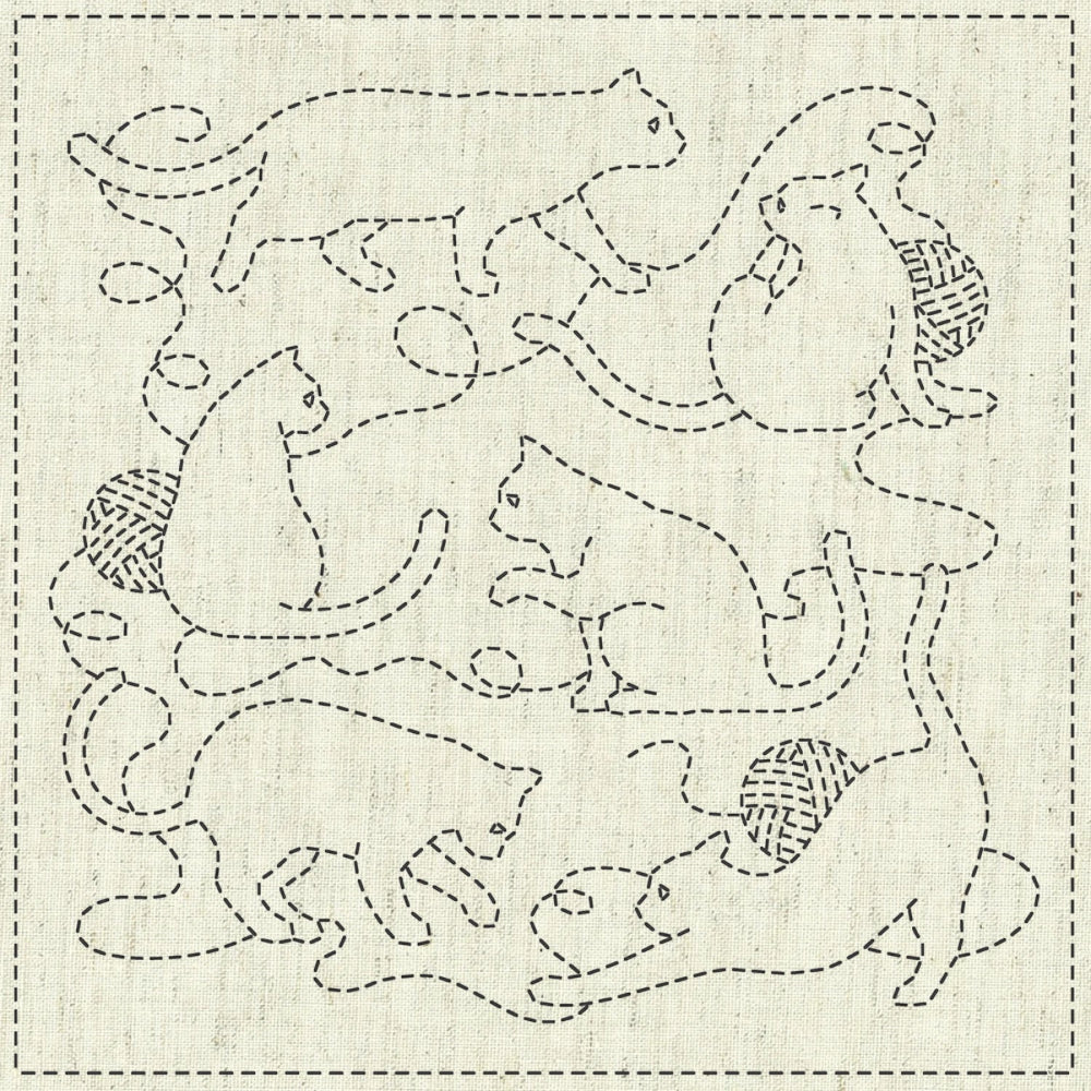 Beige cloth with cats and yarn printed on it