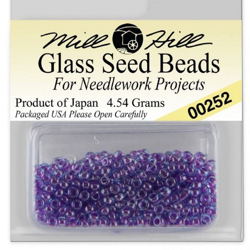 Packaged glass seed beads with Mill Hill branding on a white background