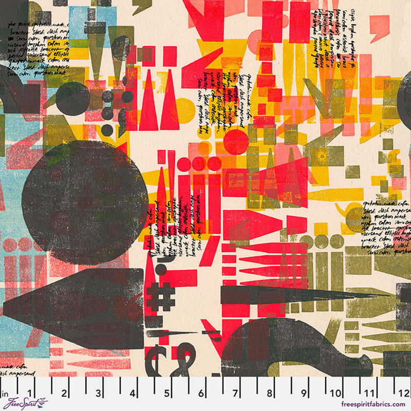 Colorful abstract pattern with geometric shapes on a fabric swatch, featuring a ruler for scale.