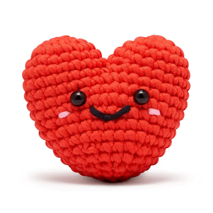 Front view of a red crocheted heart