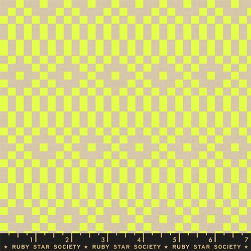Fabric with a pixelated geometric pattern in neon yellow and tan.