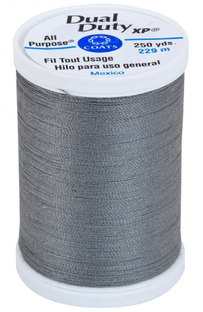 A spool of gray dual-purpose sewing thread on a white plastic core, labeled 'Dual Duty XP' by COATS.