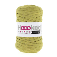 Ball of green yarn with a 'Hoooked' label on a white background