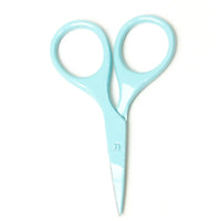Light blue scissors on a white background