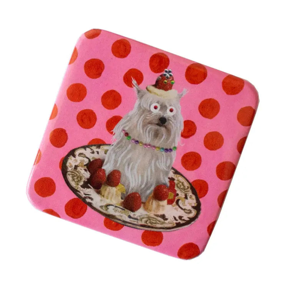 Square pin with a dog illustration on a pink background with red polka dots