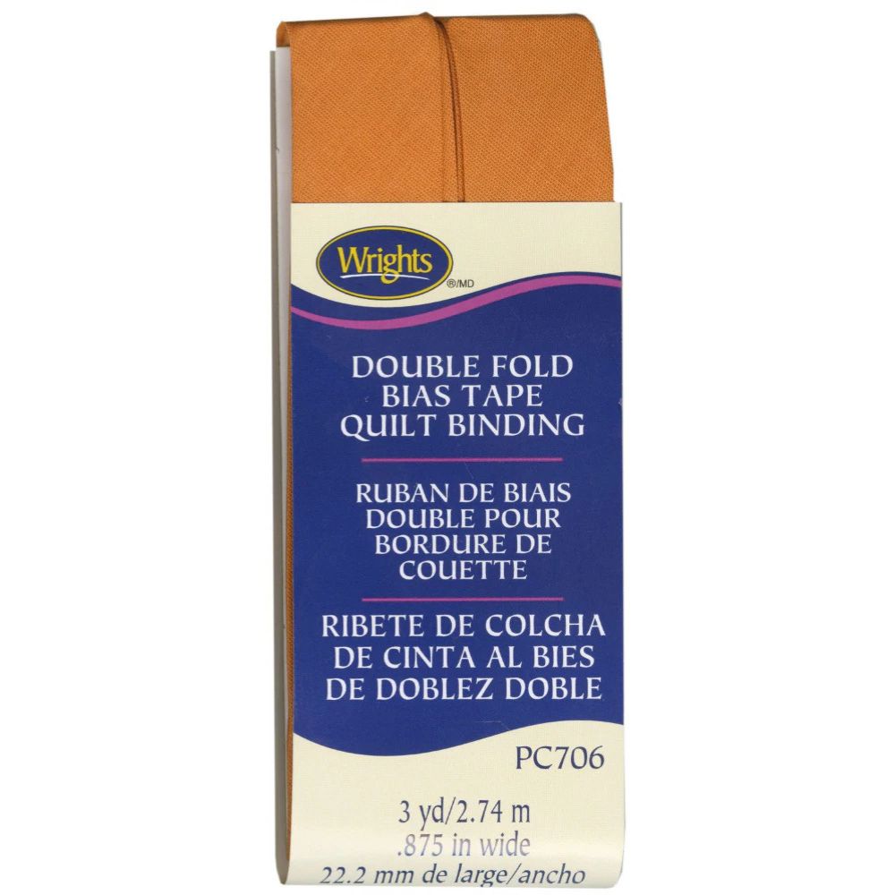 Box of Wright's double fold orange bias tape quilt binding on a white background
