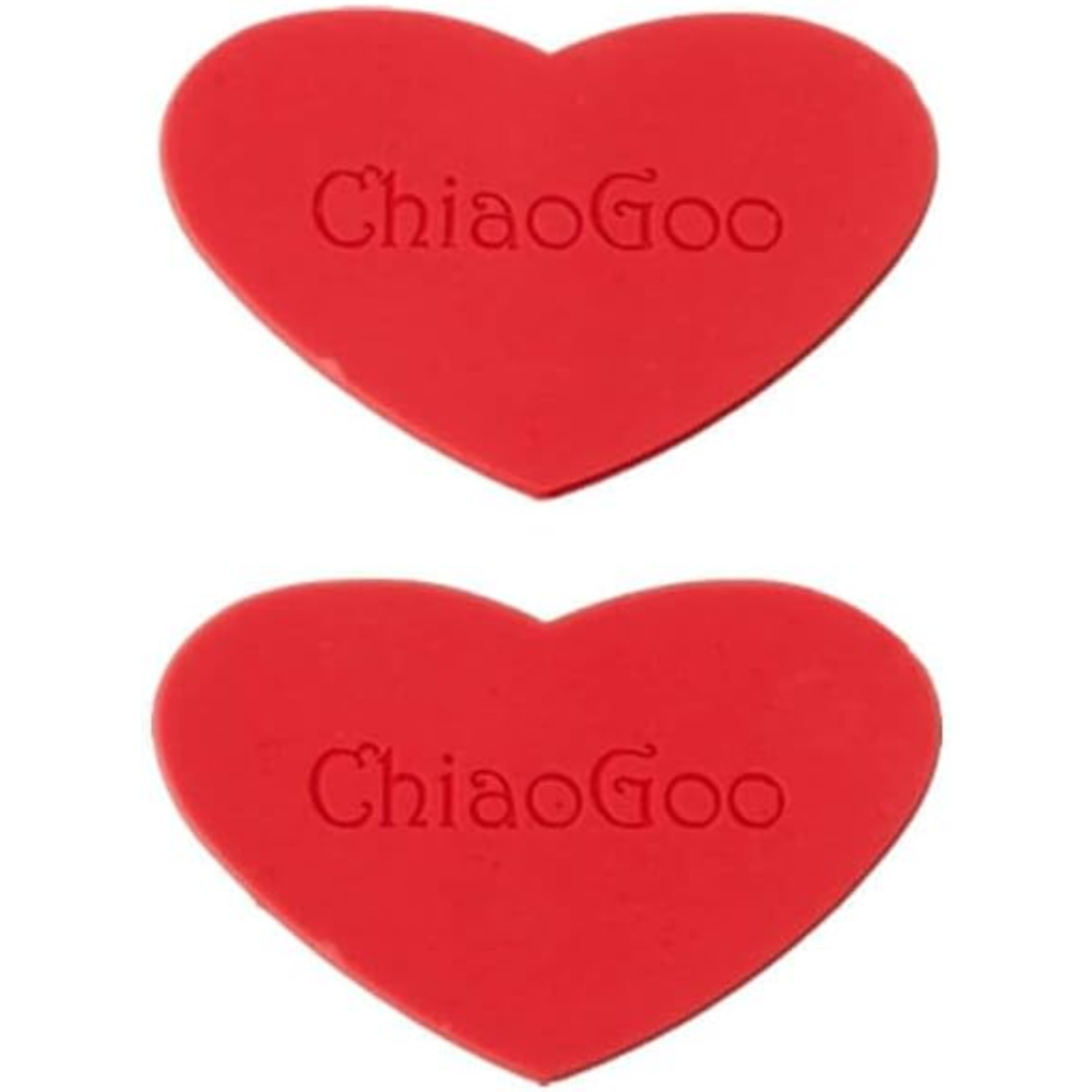 Two red heart-shaped rubber pieces with "ChiaoGoo" written on them on a white background
