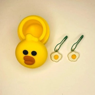 Mini silicone chicken-shaped jar with two enamel fried egg-shaped knitting and crochet stitch markers