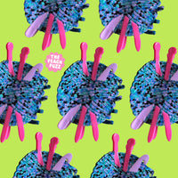 Pattern of blue and pink yarn balls with 'The Peach Fuzz' text on a green background