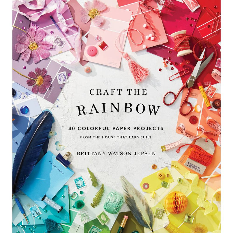 Book cover of 'Craft the Rainbow' with colorful paper projects and tools.