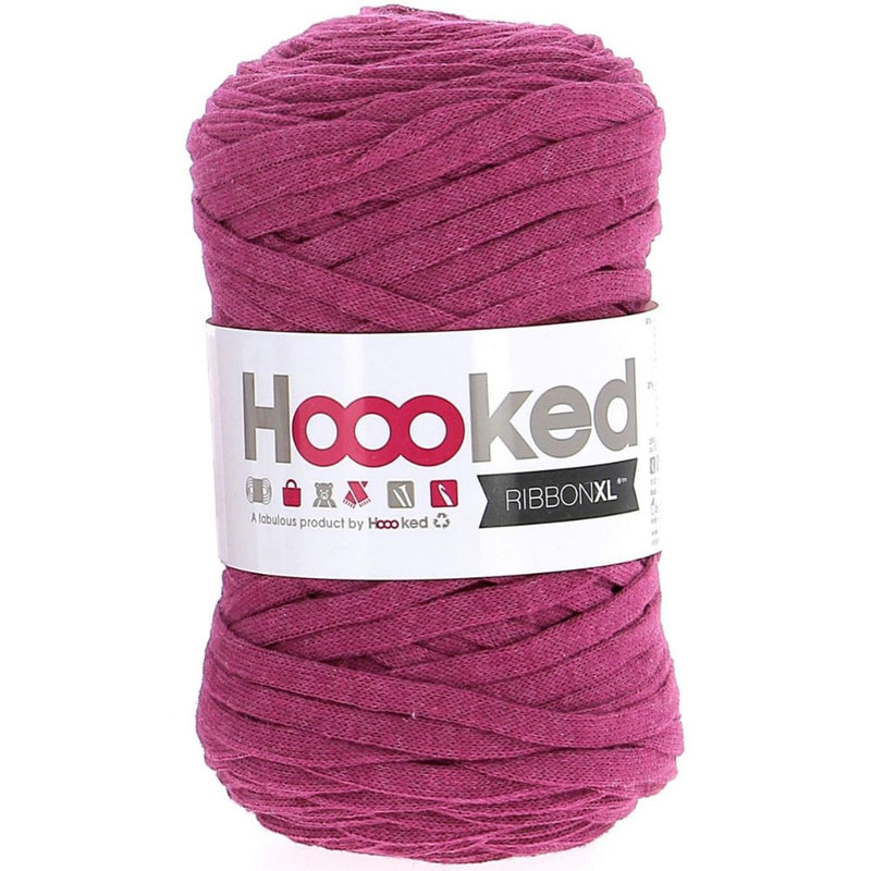 Ball of pink yarn with 'Hoooked' label on a white background