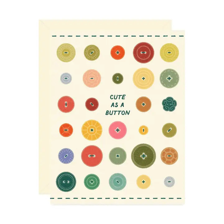 Off-white greeting card featuring vintage inspired colorful buttons arranged in a grid pattern and text reading “Cute as a Button" on a white background.