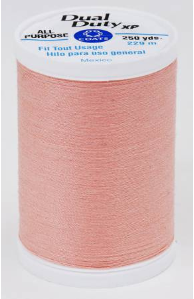 A spool of pink orange Dual Duty XP sewing thread with a white label featuring blue and black text, set against a plain white background.