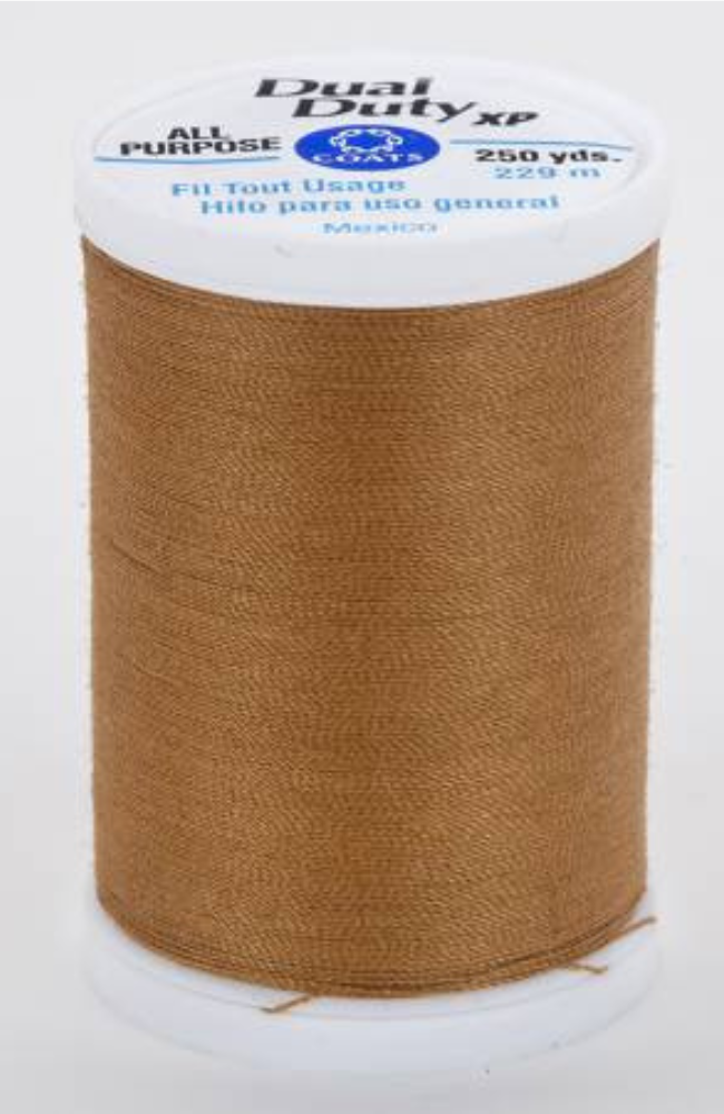 A spool of brown Dual Duty XP all-purpose sewing thread on a white plastic core, with a white paper label at the top.