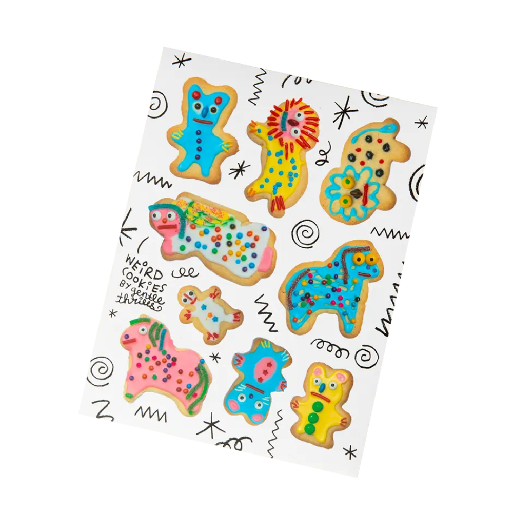 Sheet of colorful animal-shaped cookie stickers on a white background
