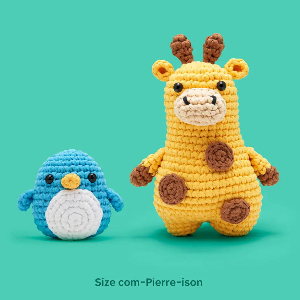 Crocheted giraffe and penguin toy on a teal background with text labeled "Size com-Pierre-ison"