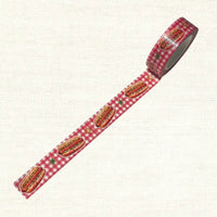 Roll of decorative tape with hot dog design on a white background