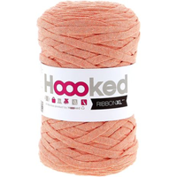 Ball of pink yarn with 'Hoooked' label on a white background