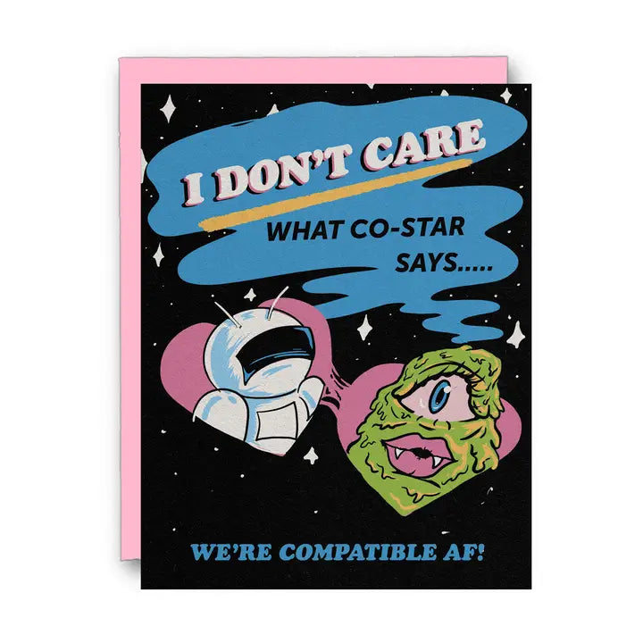 Black and pink greeting card featuring an astronaut and an alien with the text "I don't care what co-star says.....we're compatible af!"