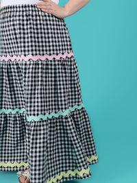 Sinead (gingham maxi skirt) is wearing a size 10 (UK 24).