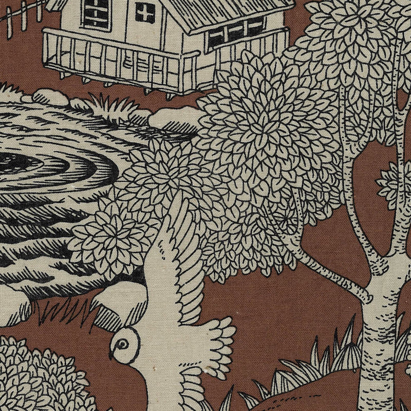 Patterned fabric with a house, trees, and animals on a brown background