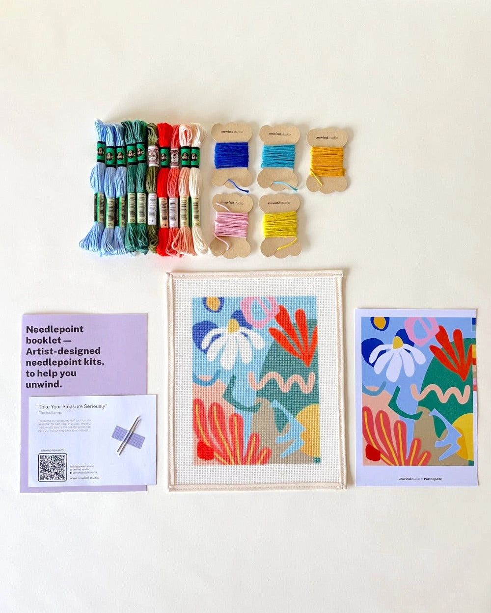The contents of a needlepoint kit from Unwind Studio