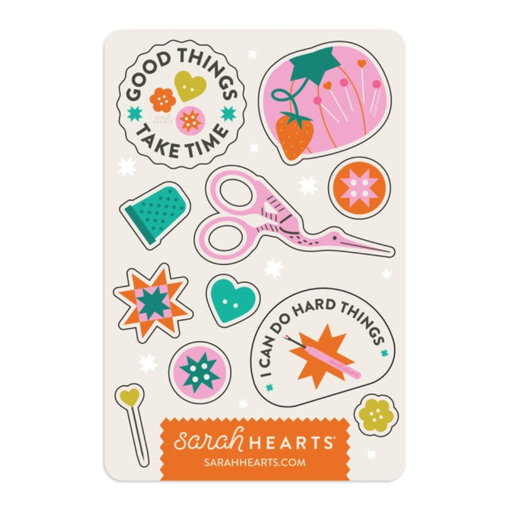 Sticker sheet with sewing-themed designs, including scissors, a pincushion, a thimble, quilting stars, and phrases "Good Things Take Time" and "I Can Do Hard Things."