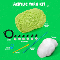 Contents of peas in a pod kit. Yarn, floss, eyes, stitch marker, needle, crochet hook and stuffing