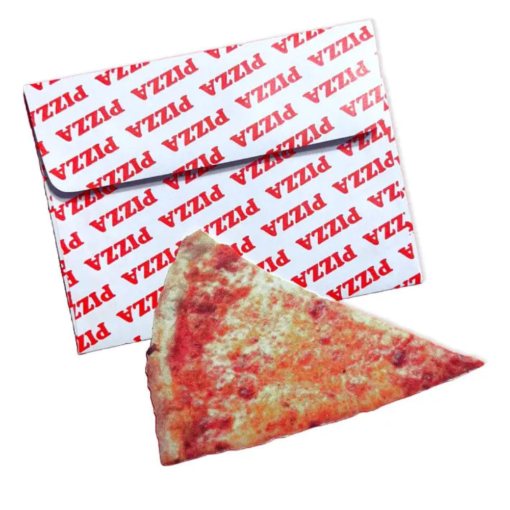 Pizza slice in front of a pizza box with 'PIZZA' printed on it.