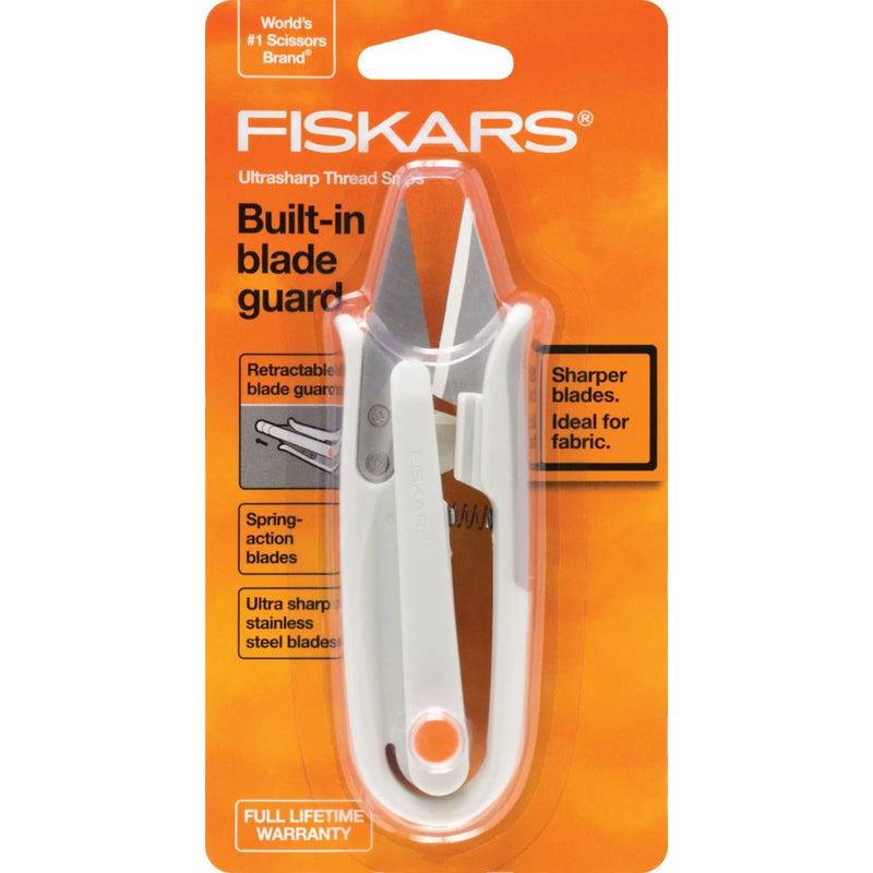 Fiskars scissors with built-in blade guard on an orange packaging