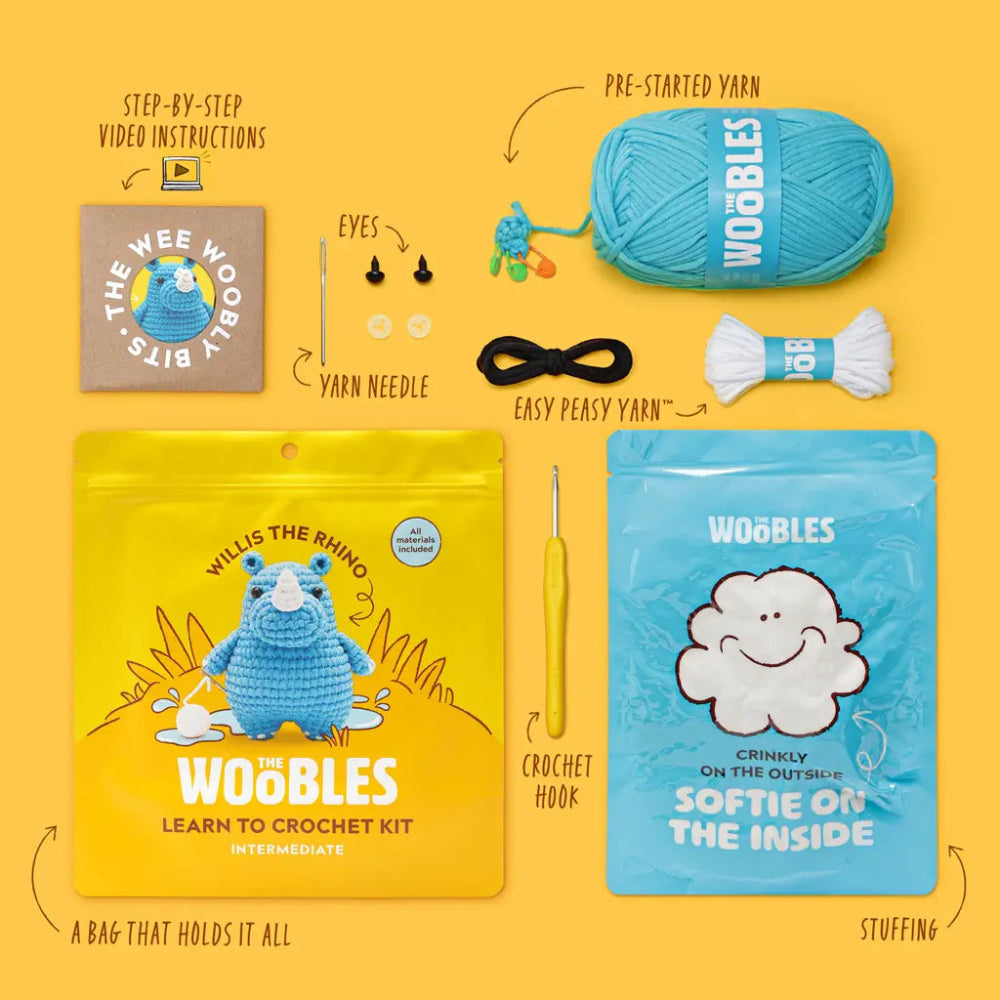 Woobles crochet kit with yarn, hook, and instructions on a yellow background