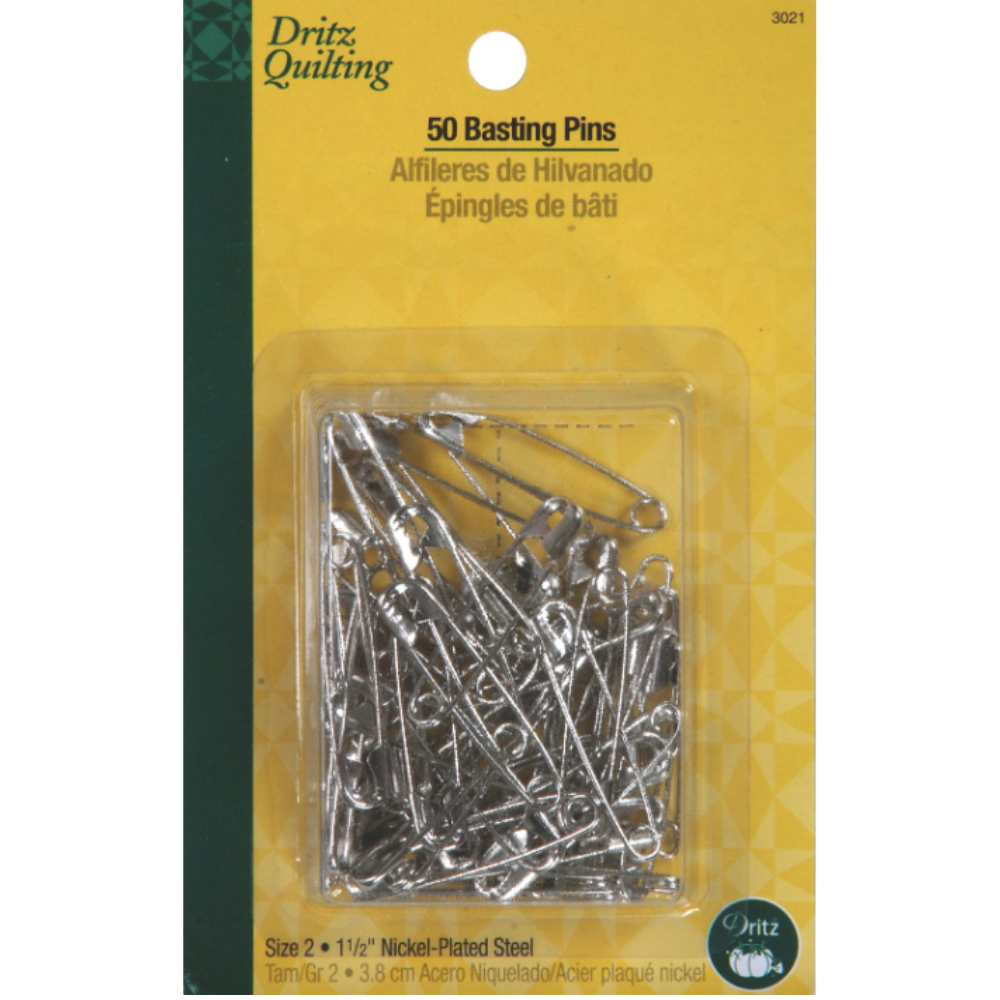 Package of Dritz Quilting basting pins with a yellow and green background