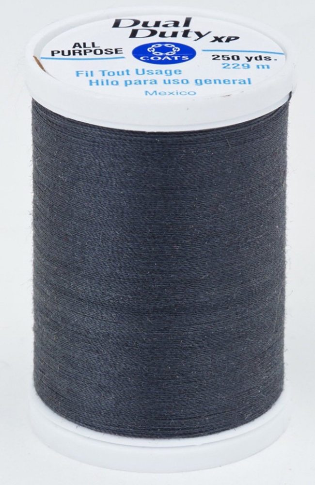Dark gray thread on a white spool with text Dual Duty XP written on top.