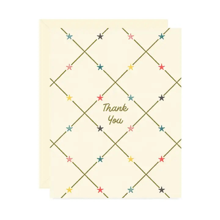 Beige greeting card showcasing a vintage inspired star lattice pattern with text reading “Thank You" on a white background.